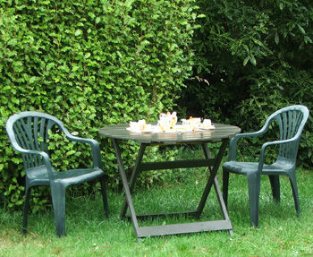 With the tea-set. With the tea-set.