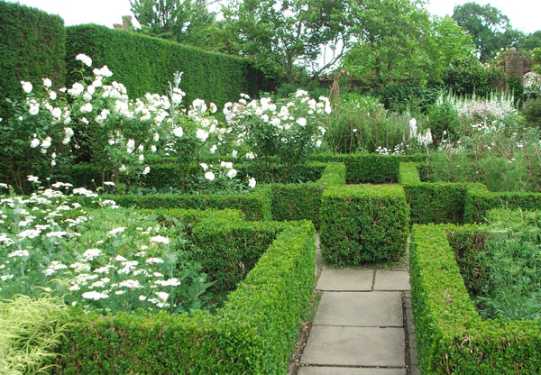  With lots of green box hedges. 