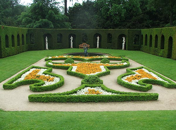  Surrounded by arches of greenery. 