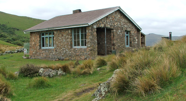  One of a series of huts overlooking the harbour. 