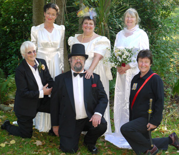  Groomsman Clare, Groom Ken and Prince Glenis with three radiant brides. 