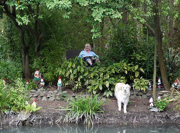  With Rusty the dog and some of my garden gnomes. 