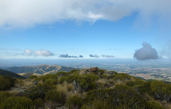  With the view out over the plains below. 