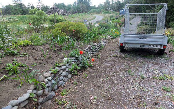  The stone wall garden being cleaned up. 
