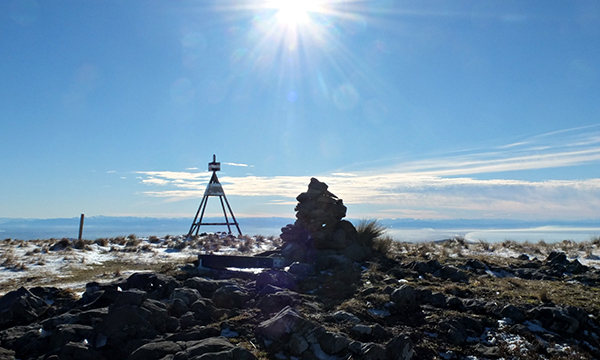  A cairn and a trig and the low winter sun. 