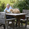 Gardener and Cat Relaxing